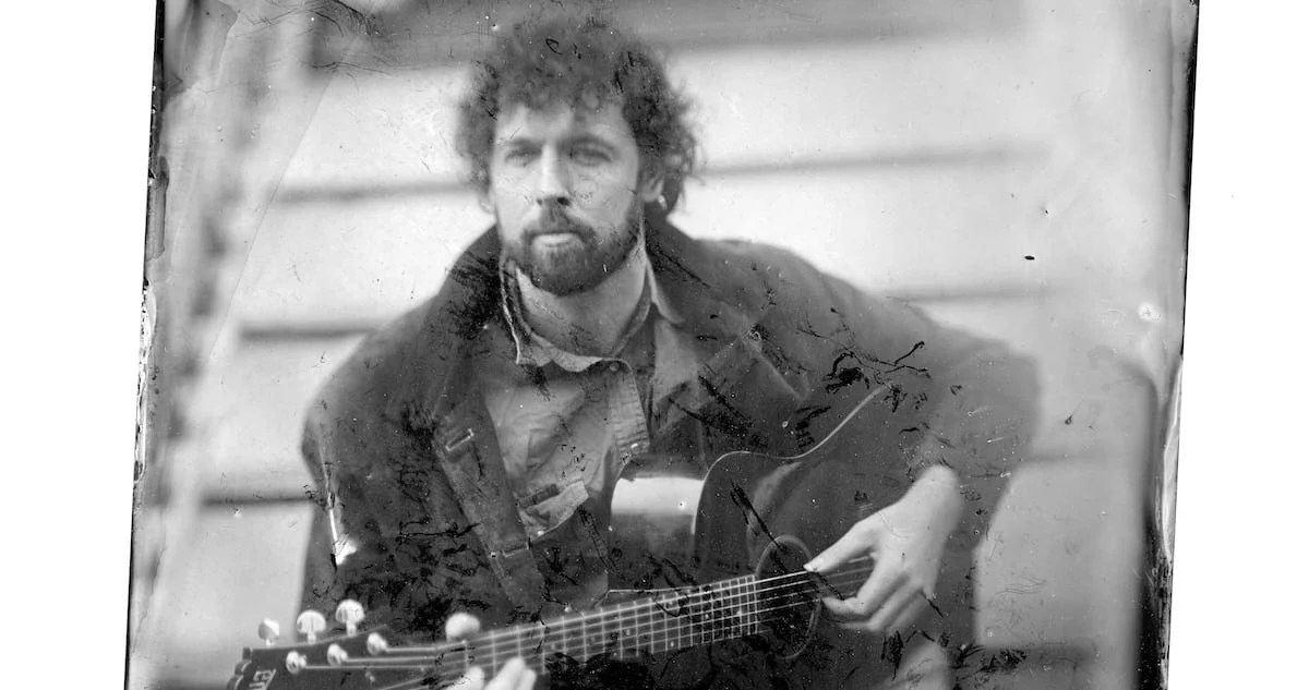 Sam Grassie, playing The Glad Cafe